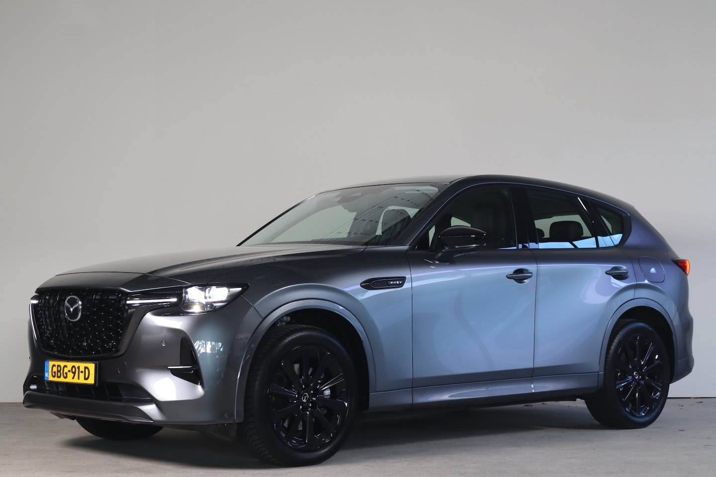 Mazda CX-60 - 2.5 e-SkyActiv PHEV Homura - NL Auto!! Stoelverw+koeling I Elek Trekhaak I Adap Cruise - AutoWereld.nl