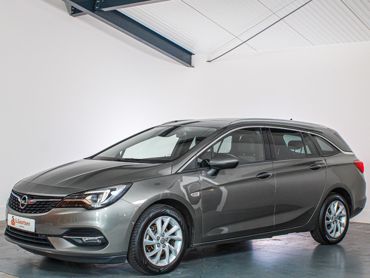 Opel Astra Sports Tourer - 1.2T 110PK Elegance Camera, Cruise Control, Dodehoek Detectie, Apple CarPlay/Android Auto, - AutoWereld.nl