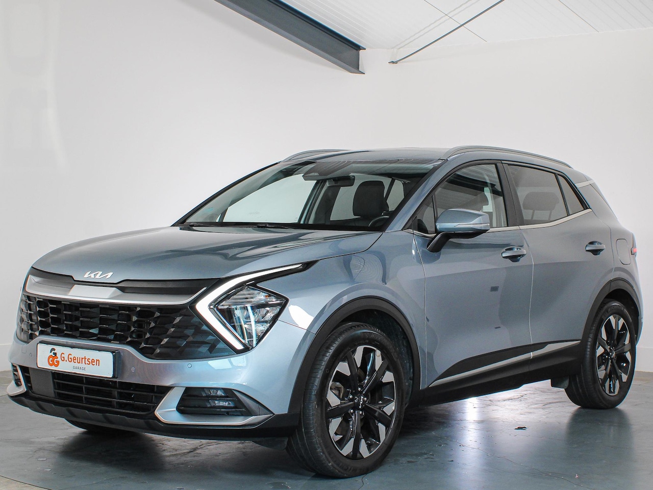 Kia Sportage - 1.6T PHEV Plug-in Hybrid AWD DynamicLine Camera, ACC, DAB, Stoel/Stuurverwarming, SOH 100% - AutoWereld.nl