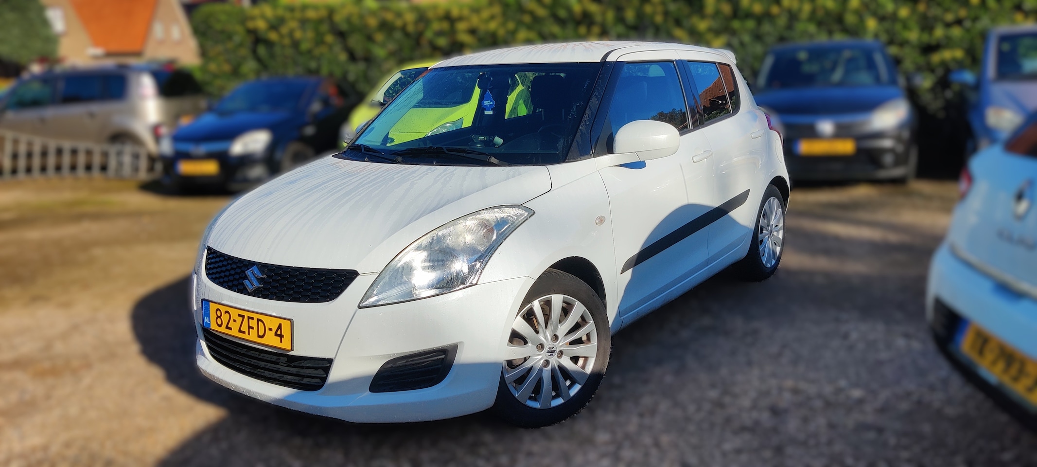 Suzuki Swift - 1.2 Bandit EASSS Start stop systeem, boekjes aanwezig, achterspoiler. - AutoWereld.nl
