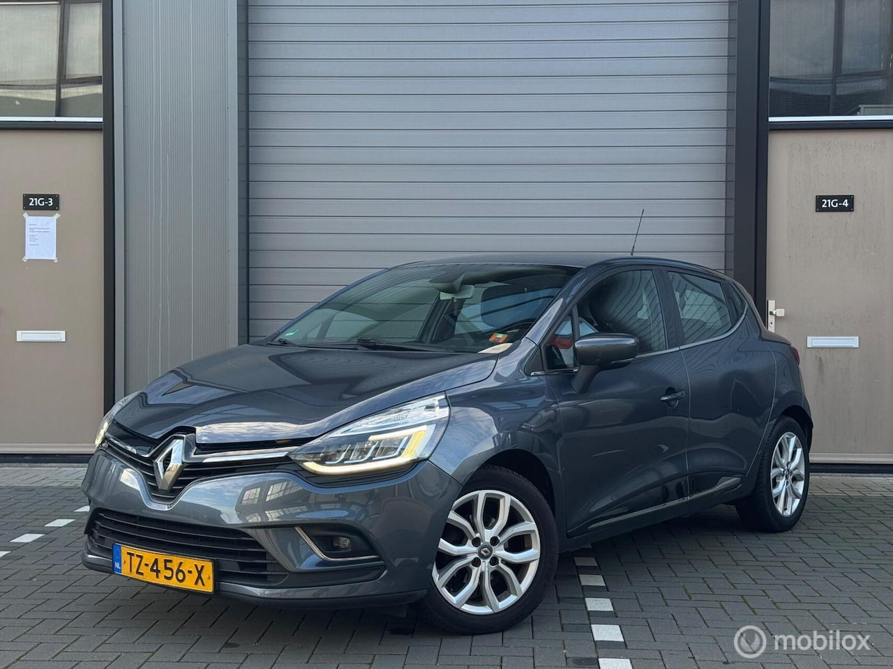 Renault Clio - 0.9 TCe Intens | LED | Trekhaak | Navi | Half/Leder | Clima | LMV | - AutoWereld.nl