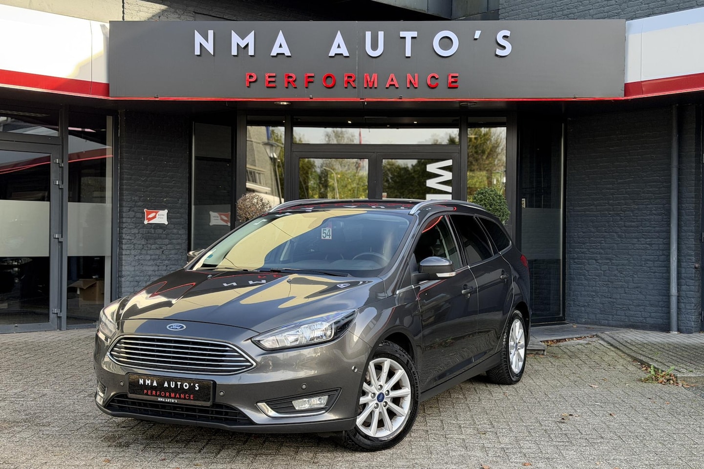 Ford Focus Wagon - 1.5 Titanium 1E EIGENAAR, CRUISE, FACELIFT, STUUR & STOELVERWARMING, 150PK - AutoWereld.nl