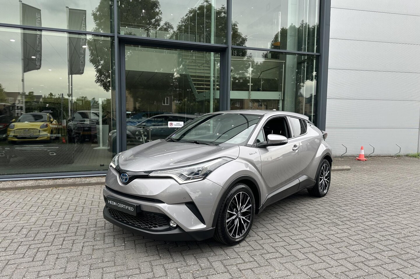 Toyota C-HR - 1.8 Hybrid Executive | Trekhaak | Navigatie | Camera | BISS - AutoWereld.nl