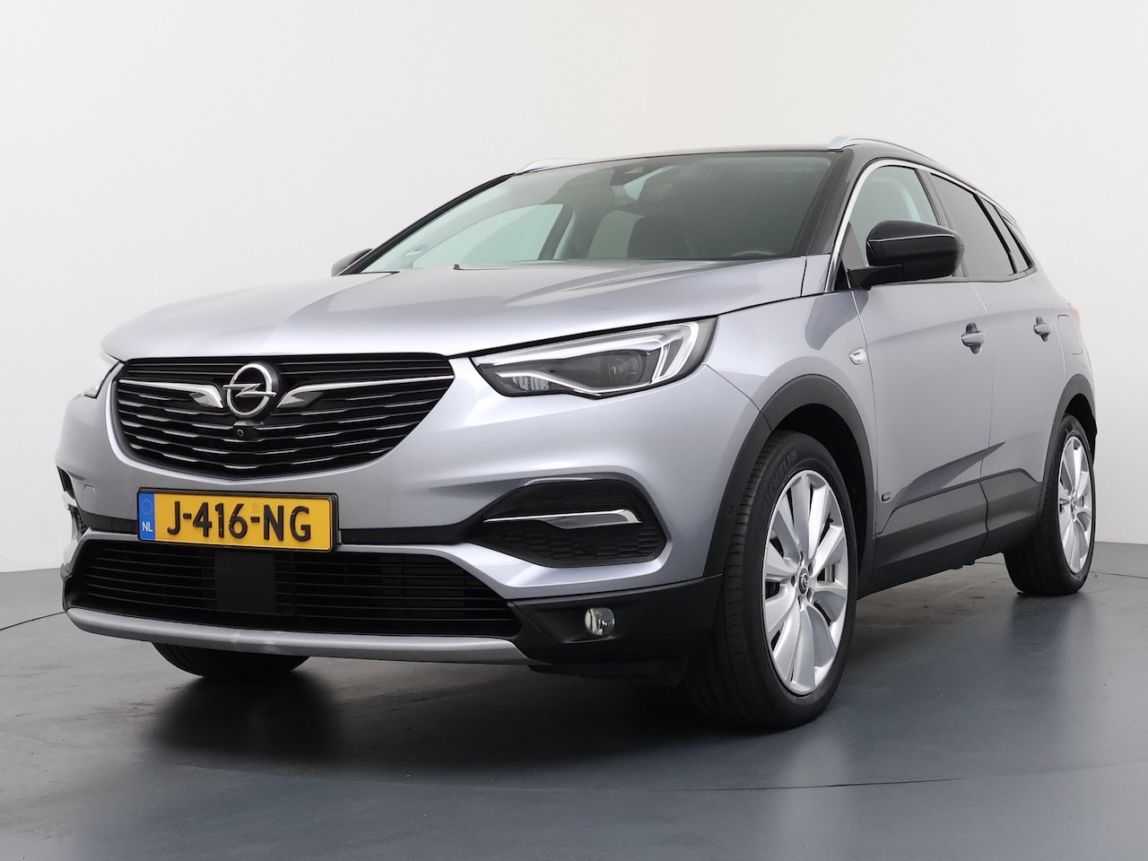 Opel Grandland X - 1.6 Turbo Hybrid4 Ultimate / Navigatie / 360 Camera / LEDER / Stoelverwarmd / Stoelverkoel - AutoWereld.nl