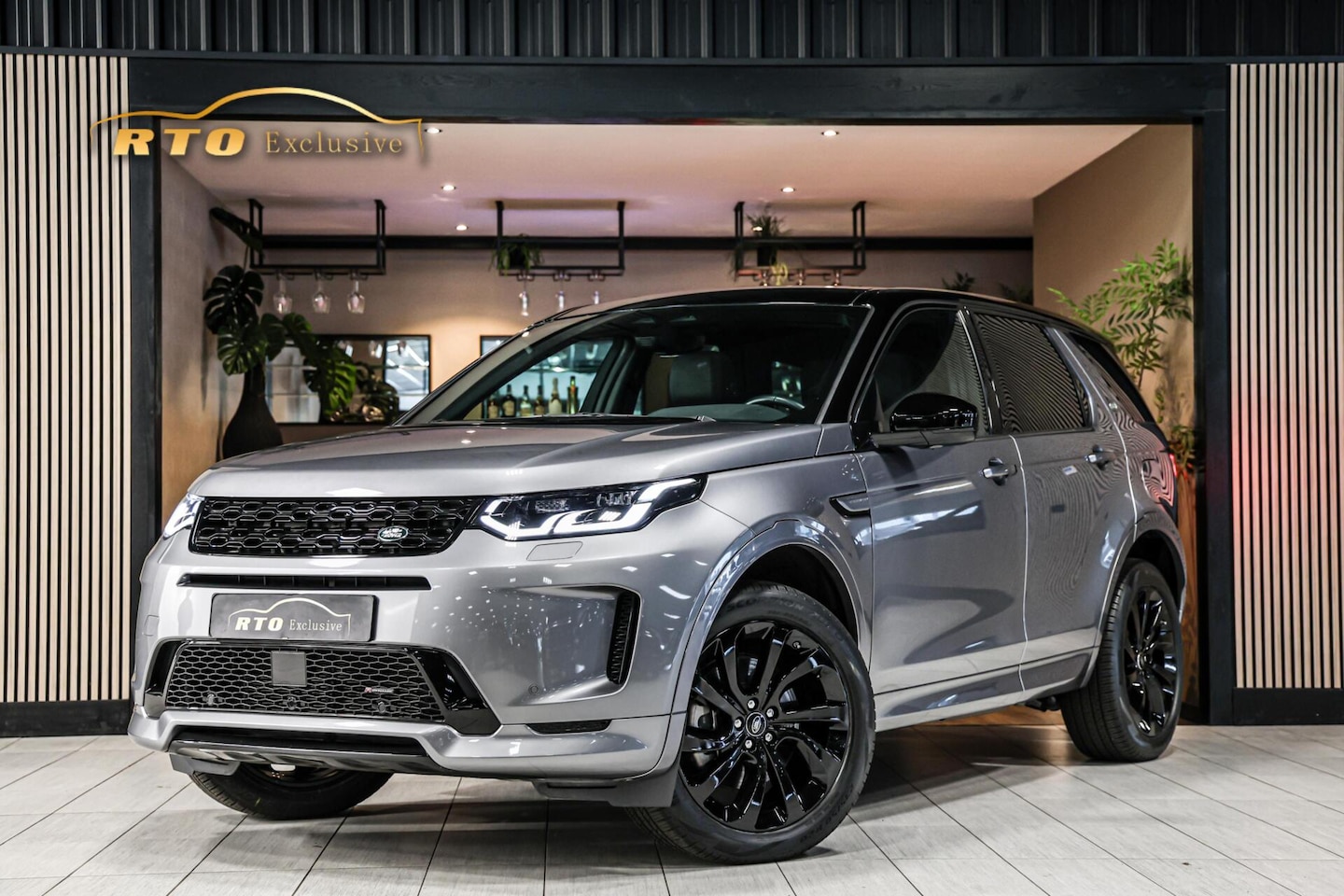 Land Rover Discovery Sport - 1.5 P300e PHEV HSE|PANO|TREKHAAK| - AutoWereld.nl