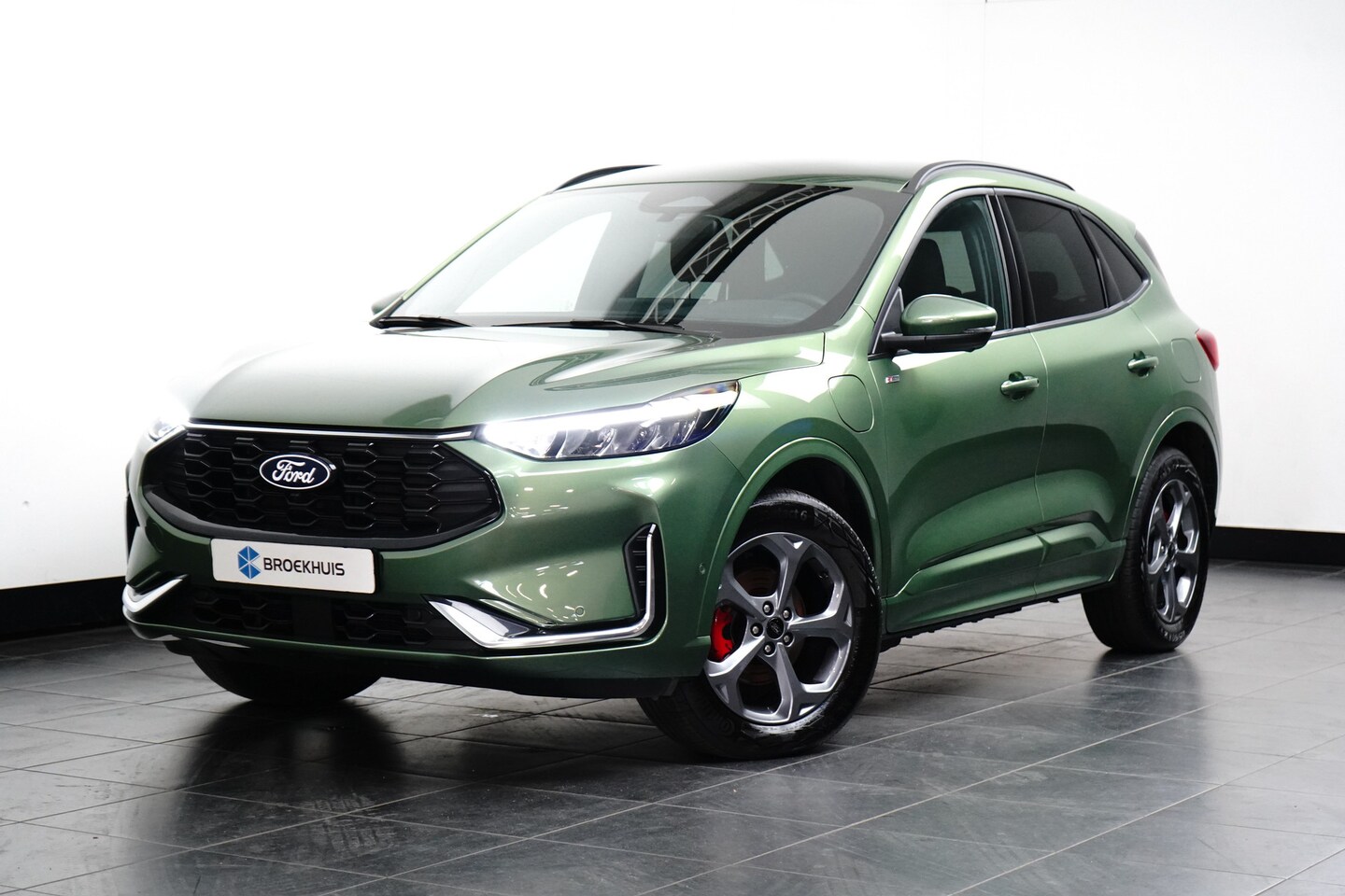 Ford Kuga - 2.5 PHEV ST-Line X | Stoelverwarming | Adap. Cruise | Apple Carplay | 2100KG Trekgewicht - AutoWereld.nl
