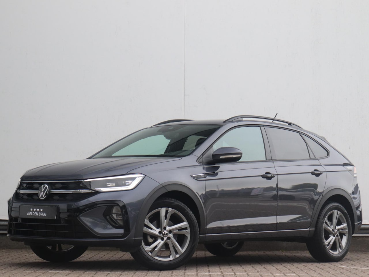 Volkswagen Taigo - 1.5 TSI R-Line | Parkeersensoren voor & achter | Navigatie via telefoon | Apple carplay / - AutoWereld.nl