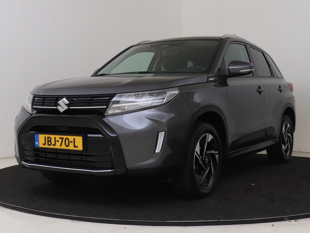 Suzuki Vitara - 1.4 Boosterjet Style Smart Hybrid | Suede Met Leder | Stoelverwarming | 17" Gepolijste Vel - AutoWereld.nl