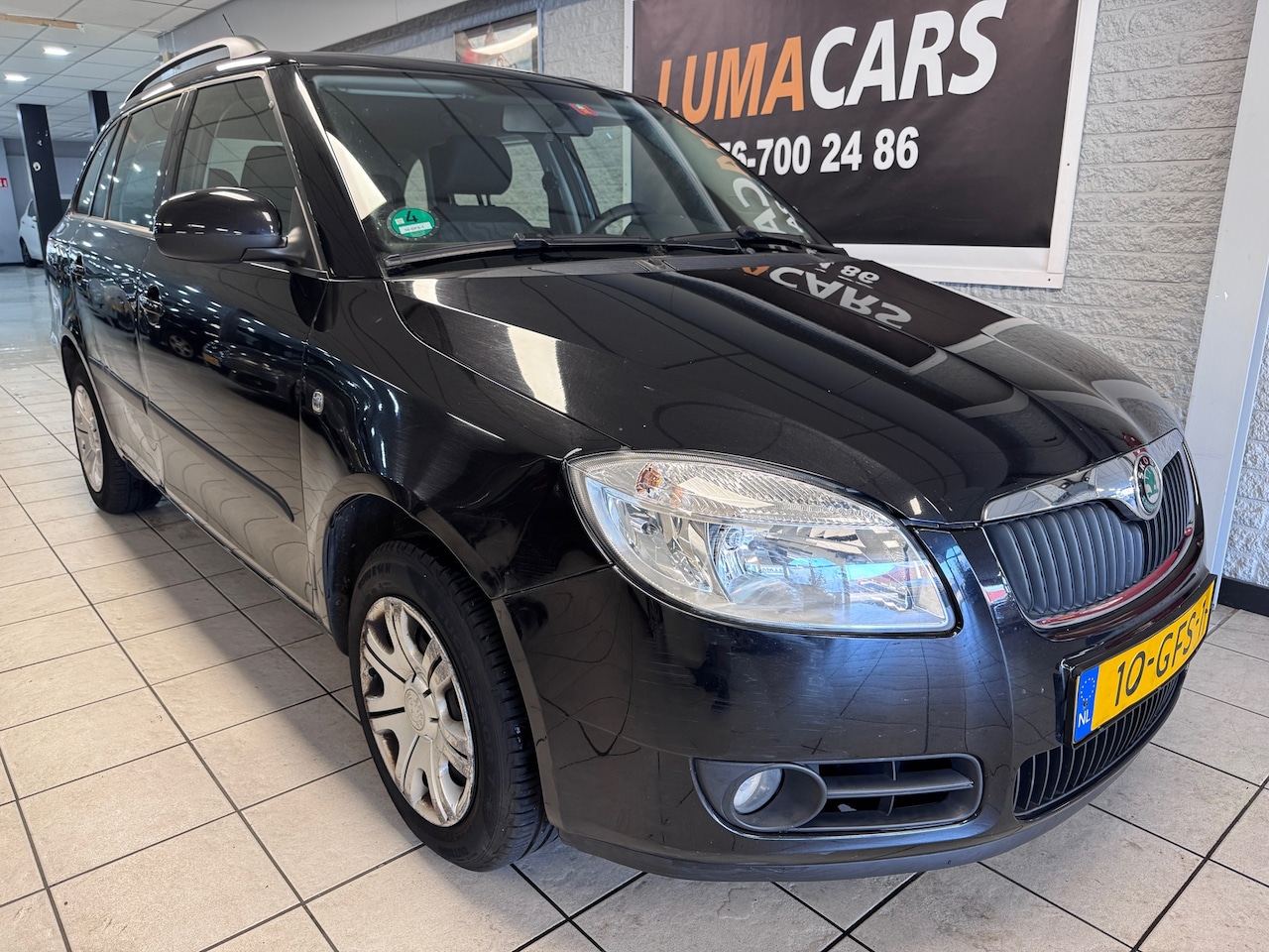 Skoda Fabia Combi - 1.4-16V Ambiente | Nieuwe APK | Cruise | - AutoWereld.nl