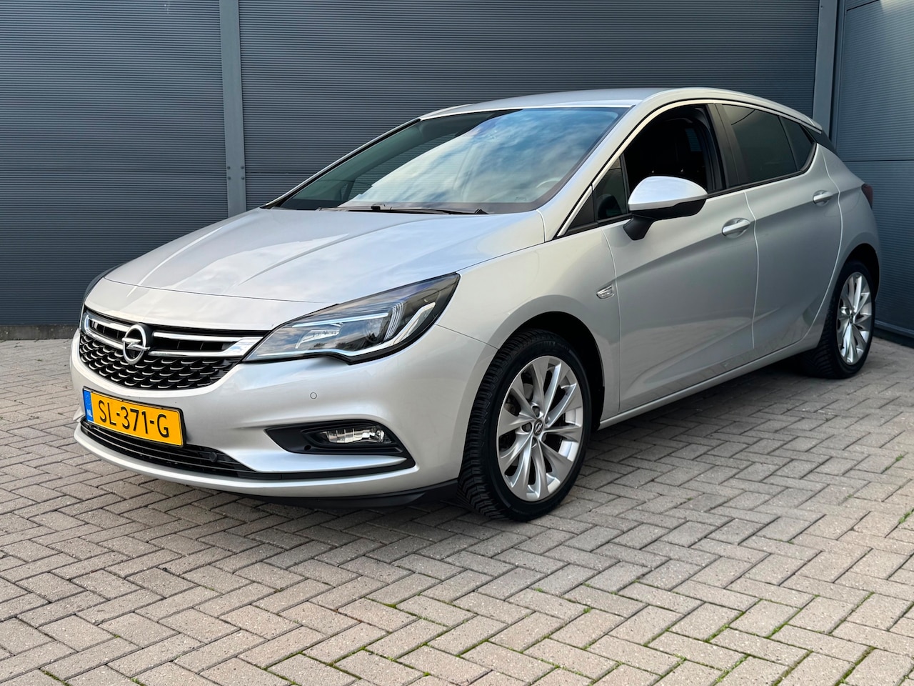 Opel Astra - 1.0 Online Edition / 64.000 km Nap / Navi / Carplay - AutoWereld.nl