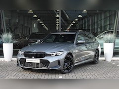 BMW 3-serie Touring - 320e M Sport Automaat / Panoramadak / Sportstoelen / Getint glas / Stoelverwarming