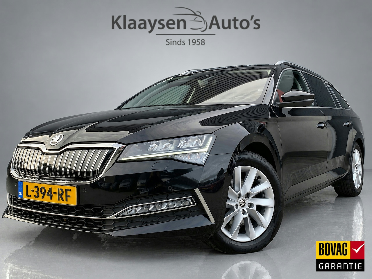 Skoda Superb Combi - 1.4 TSI iV PHEV Business Edition Plus | panoramadak | navigatie | trekhaak | camera | stoe - AutoWereld.nl