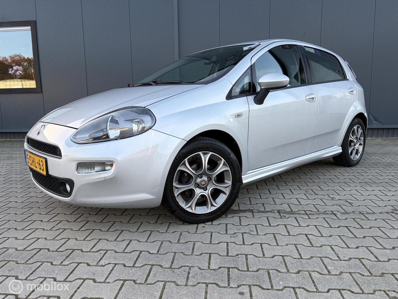 Fiat Punto Evo - 0.9 TwinAir Lounge Airco Trekhaak 1ste Eigenaar - AutoWereld.nl