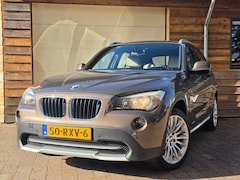 BMW X1 - 1.8i sDrive Executive Automaat Shadowline Harman/Kardon Leder Clima Navi NAP 2e eigenaar!