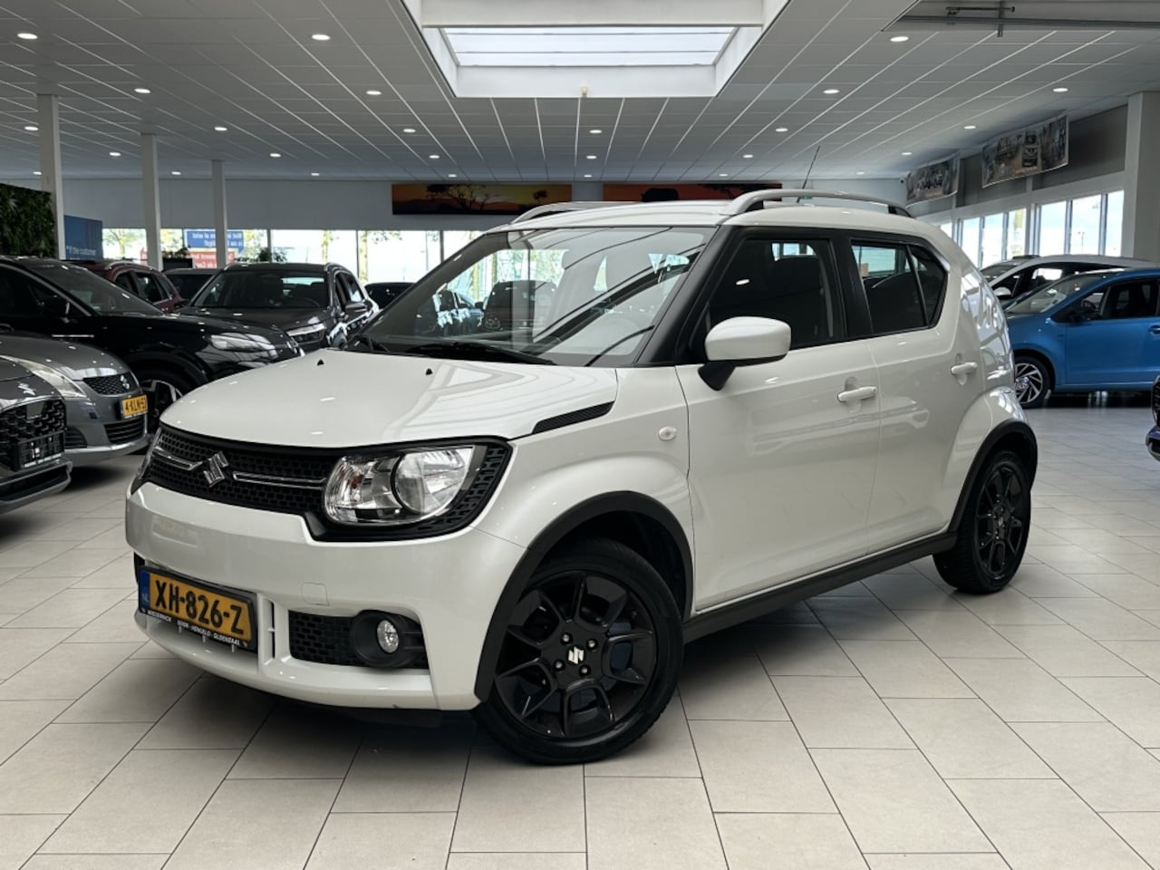 Suzuki Ignis - 1.2 Select [ CAMERA I ALL-SEASON I AIRCO I STOELVERWARMING ] - AutoWereld.nl