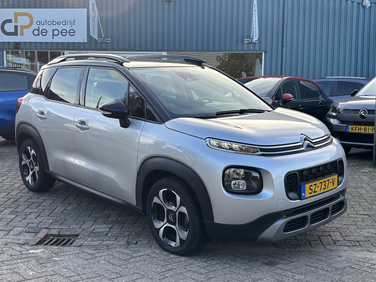 Citroën C3 Aircross - 1.2 PureTech S&S Shine GARANTIE/CRUISE/CLIMA/CARPLAY/TREKHAAK/P.SENS.+CAM/LICHTMETAAL rijk - AutoWereld.nl