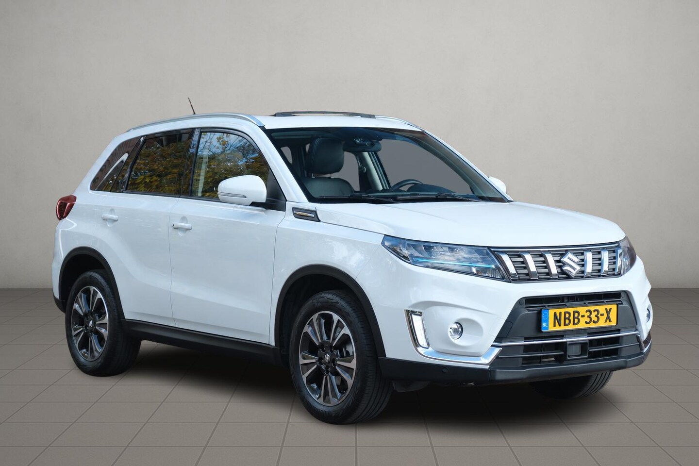 Suzuki Vitara - 1.5 Hybrid Aut. Style - Panoramadak - Adaptieve cruise - Achteruitrijcamera - Dodehoekdete - AutoWereld.nl