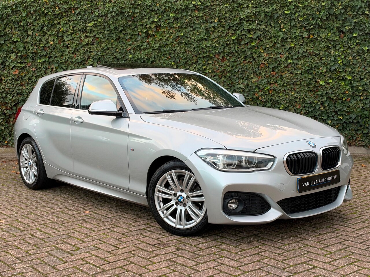 BMW 1-serie - 116d High Executive | M-Sport | Navi | Dakje | Leder | Led - AutoWereld.nl
