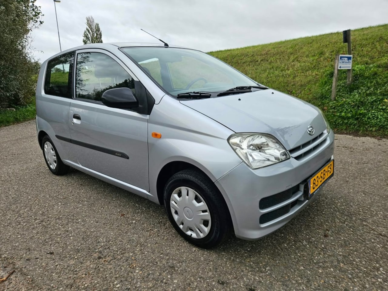 Daihatsu Cuore - 1.0-12V Azure 1.0-12V Azure,Nieuwe APK, Nette Staat - AutoWereld.nl