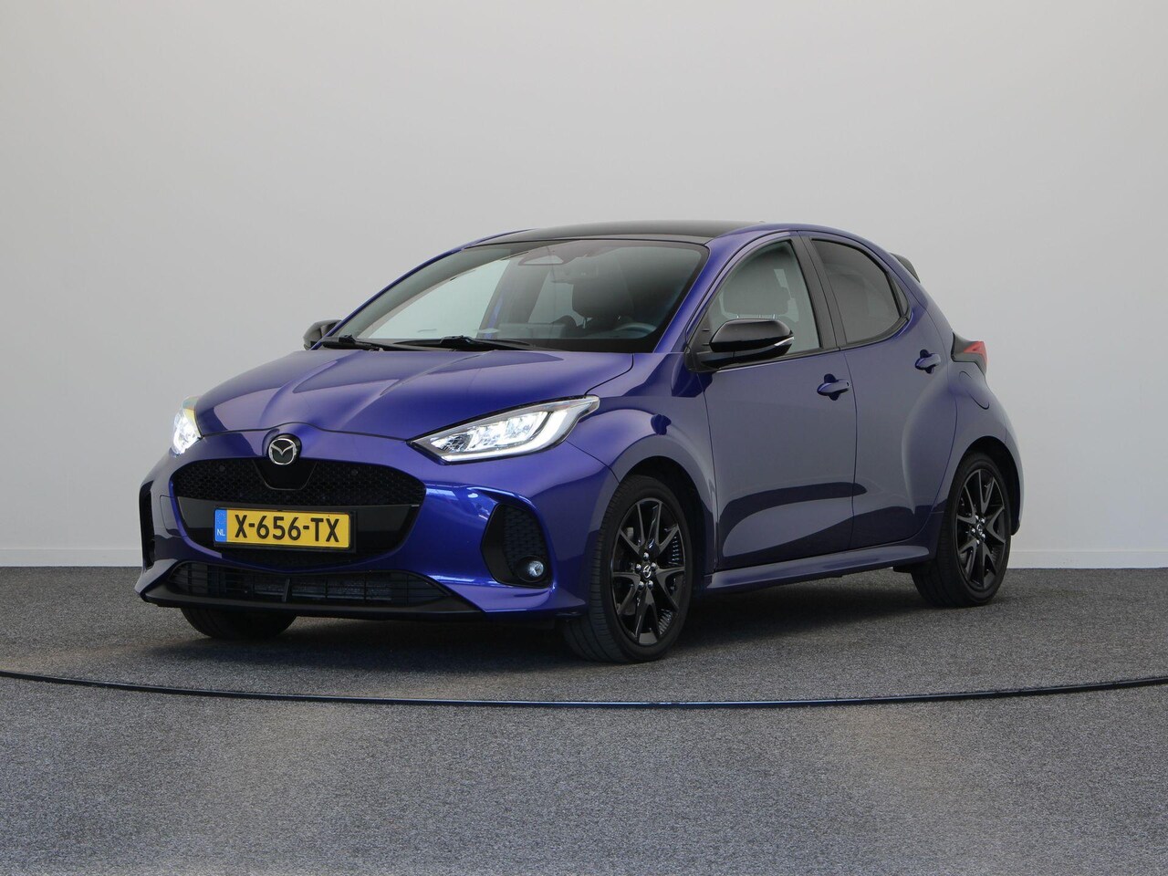 Mazda 2 Hybrid - 1.5 Homura Plus | panoramadak | Apple carlay-android auto | stoelverwarming | Head-up disp - AutoWereld.nl