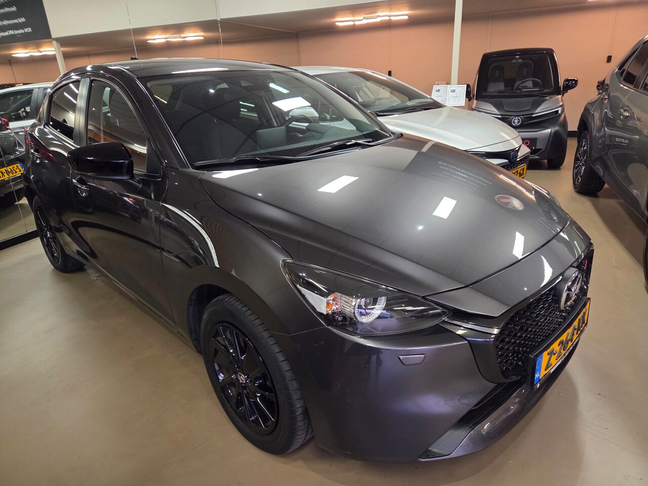 Mazda 2 - 1.5 e-SkyActiv-G 90 Homura 1.5 e-SkyActiv-G 90 Homura - AutoWereld.nl