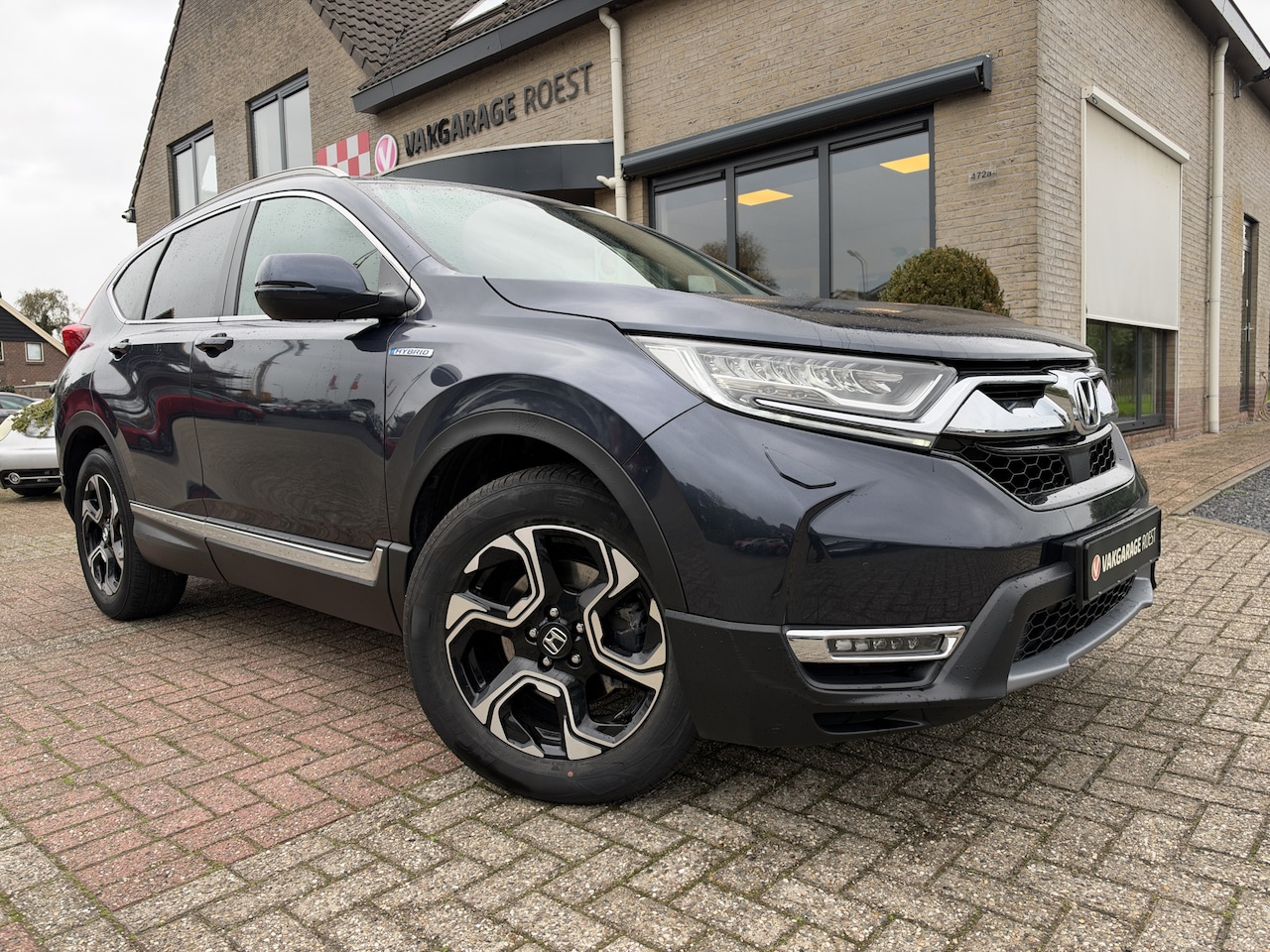 Honda CR-V - 2.0 Hybrid AWD Executive Automaat Carplay / Leder / Camera - AutoWereld.nl