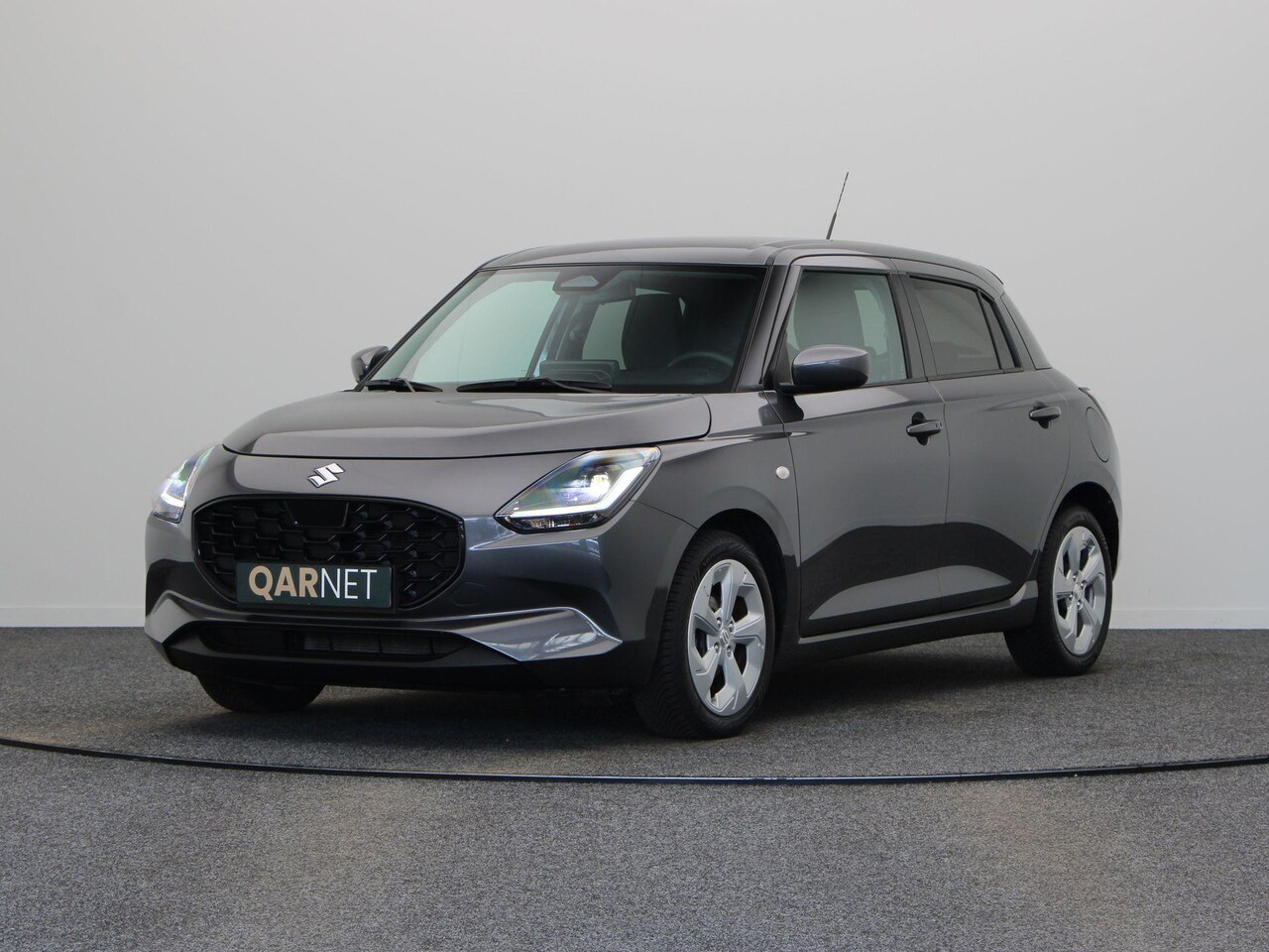 Suzuki Swift - 1.2 Comfort Smart Hybrid | Stoelverwarming | Achteruitrijcamera | Cruise Control Adaptief - AutoWereld.nl