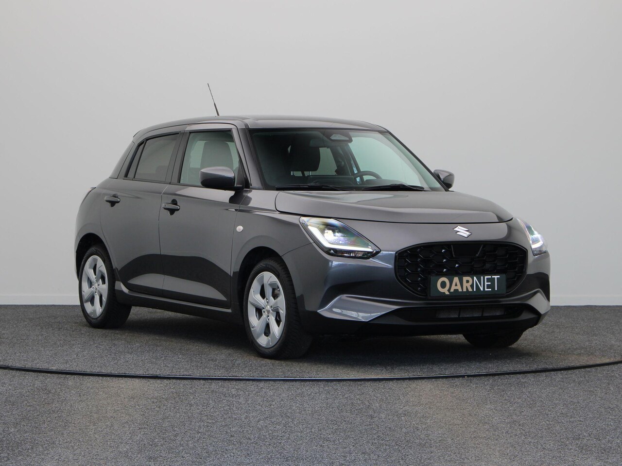 Suzuki Swift - 1.2 Comfort Smart Hybrid | Achteruitrijcamera | Stoelverwarming | Adaptieve cruise control - AutoWereld.nl