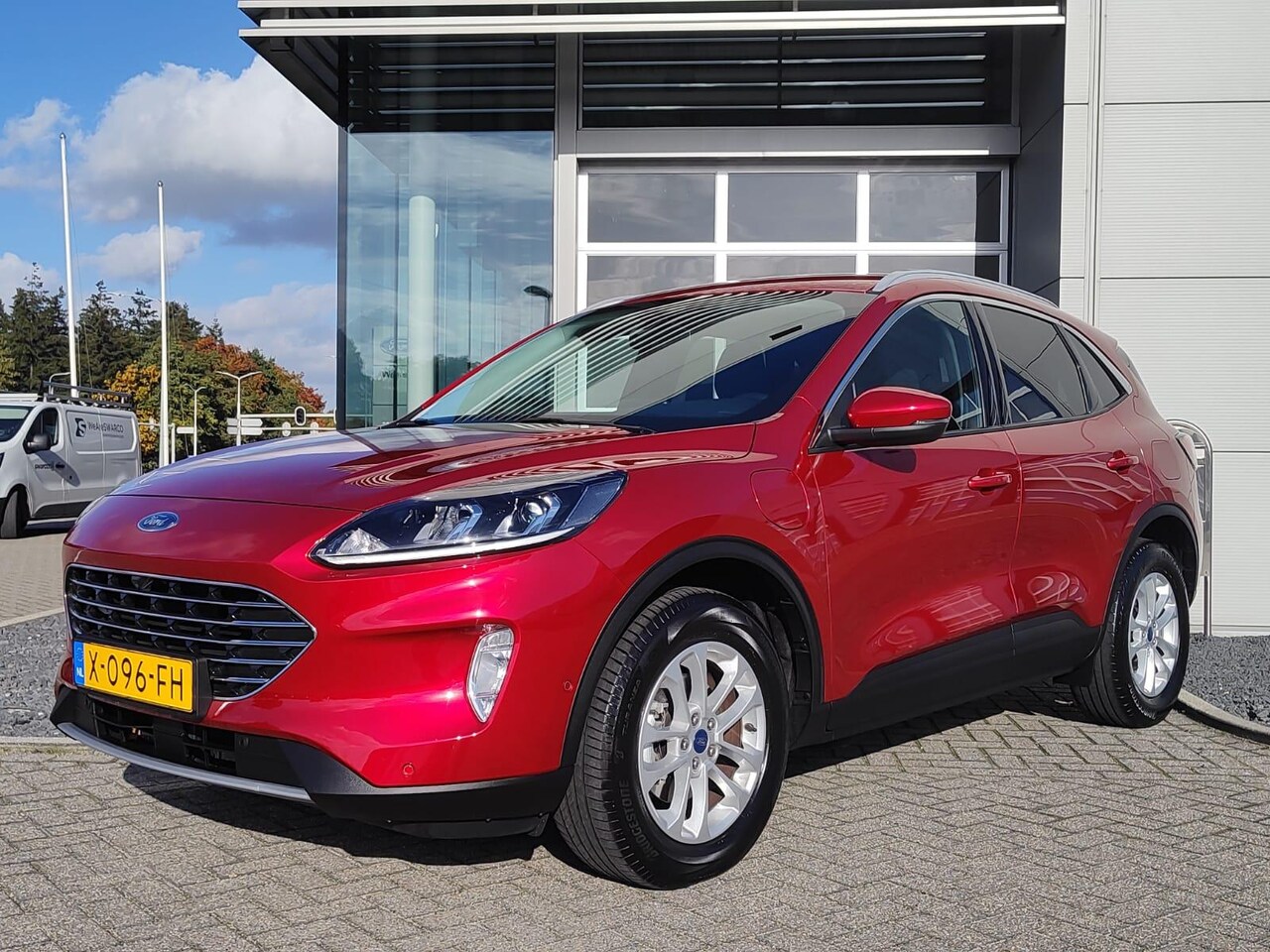 Ford Kuga - 2.5 PHEV Titanium 225pk | Adaptive cruise control | Camera | Stoelverwarming | 1e eigenaar - AutoWereld.nl