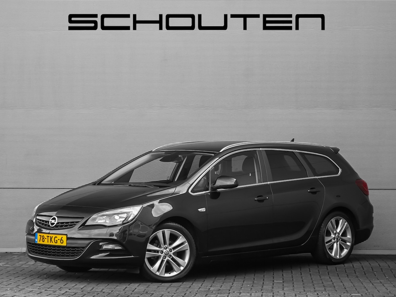 Opel Astra Sports Tourer - 1.4 Turbo Sport Navi Cruise Sportstoelen 18" - AutoWereld.nl