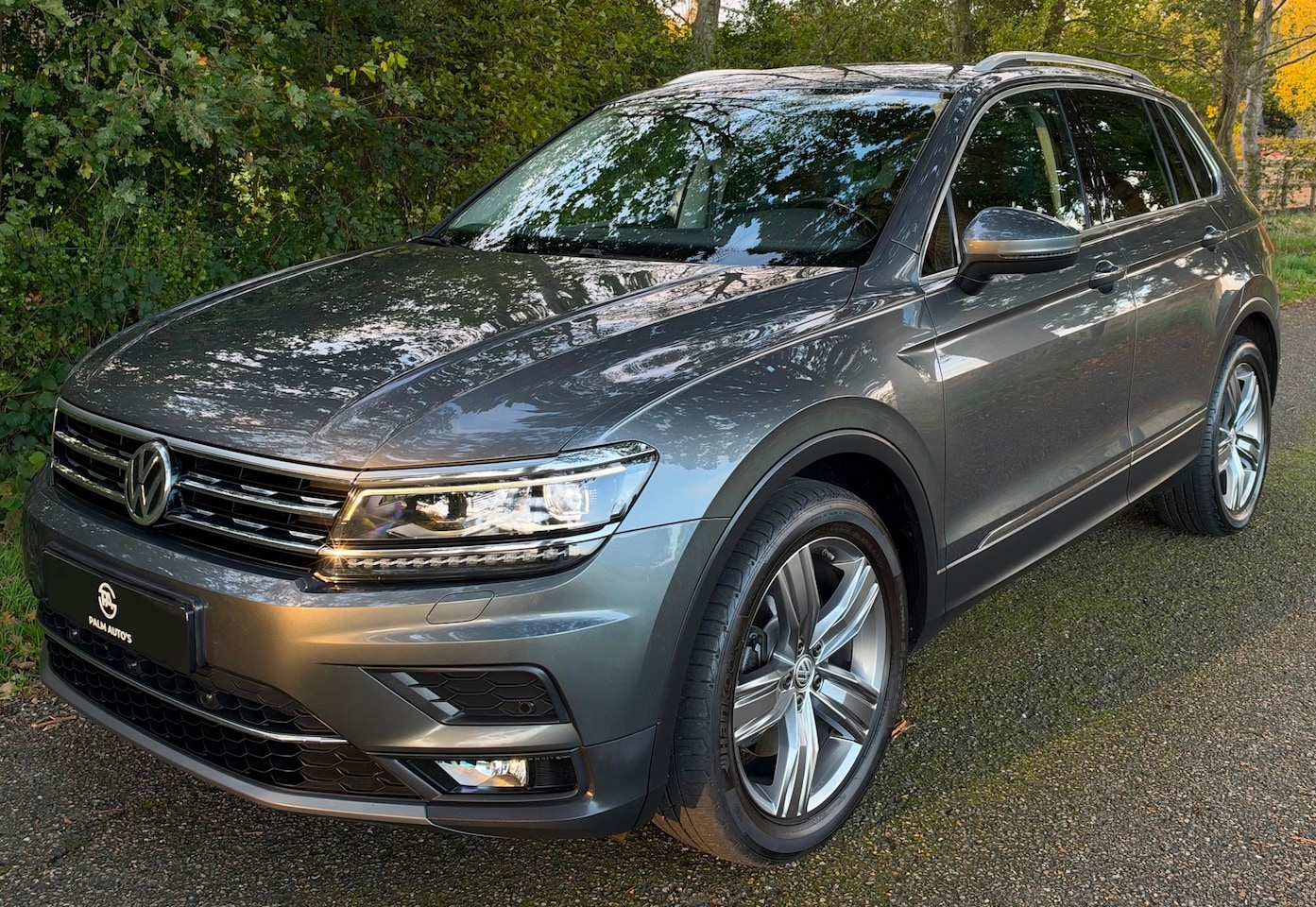 Volkswagen Tiguan - 2.0 TSI 4Motion Highline 179PK VIRTUALDASHBOARD NAVI CLIMA TREKHAAK - AutoWereld.nl