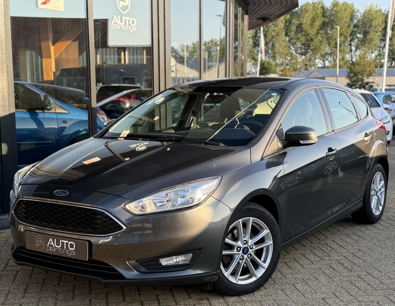 Ford Focus - 1.0 Lease Edition 125PK | 2e Eigenaar | NL AUTO | NAP | Trekhaak | Navigatie | Airco | Cru - AutoWereld.nl