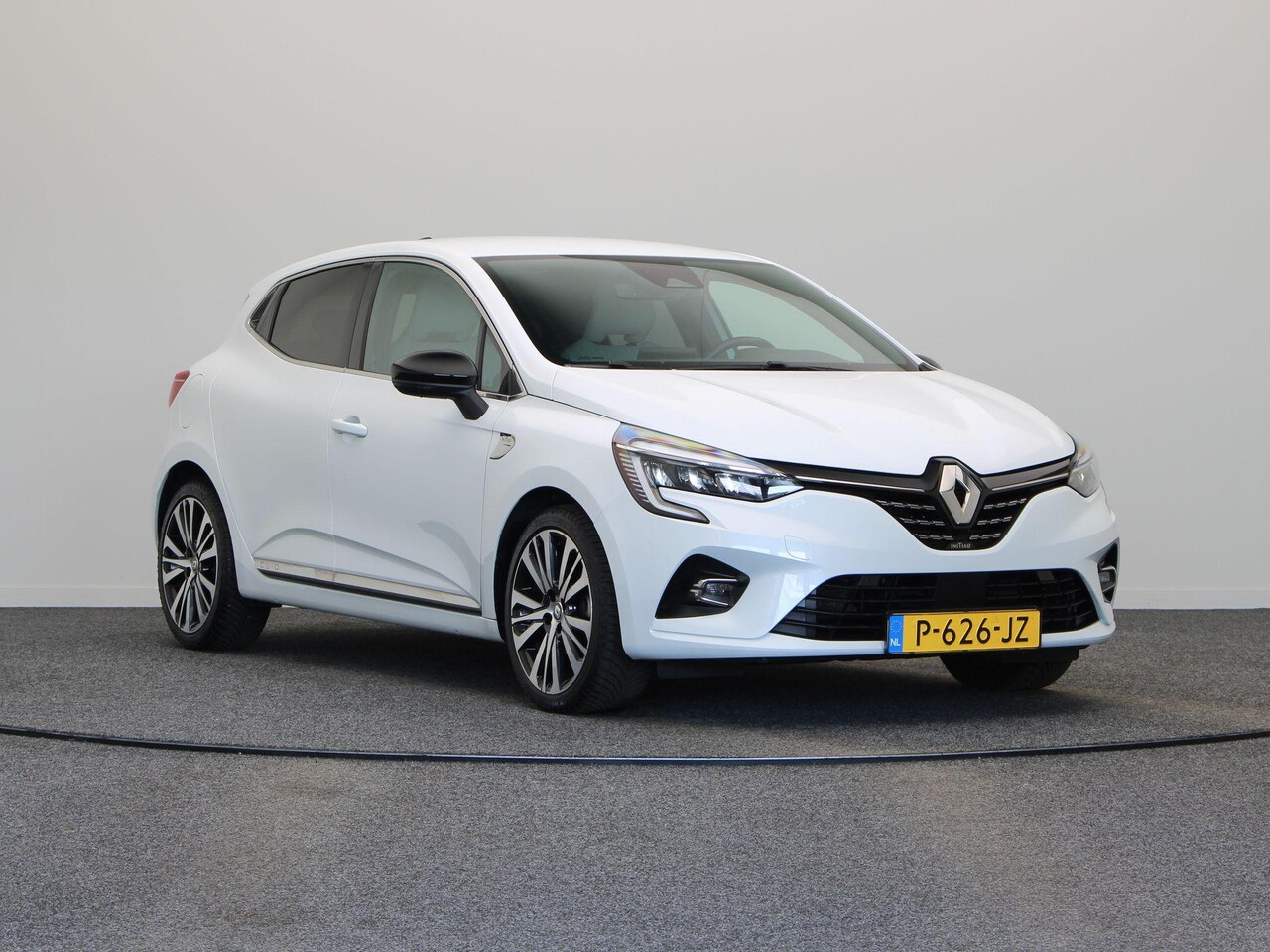 Renault Clio - E-Tech Hybrid 140pk Initiale Paris | Stoel- en stuurwielverwarming | Lederen bekleding | A - AutoWereld.nl