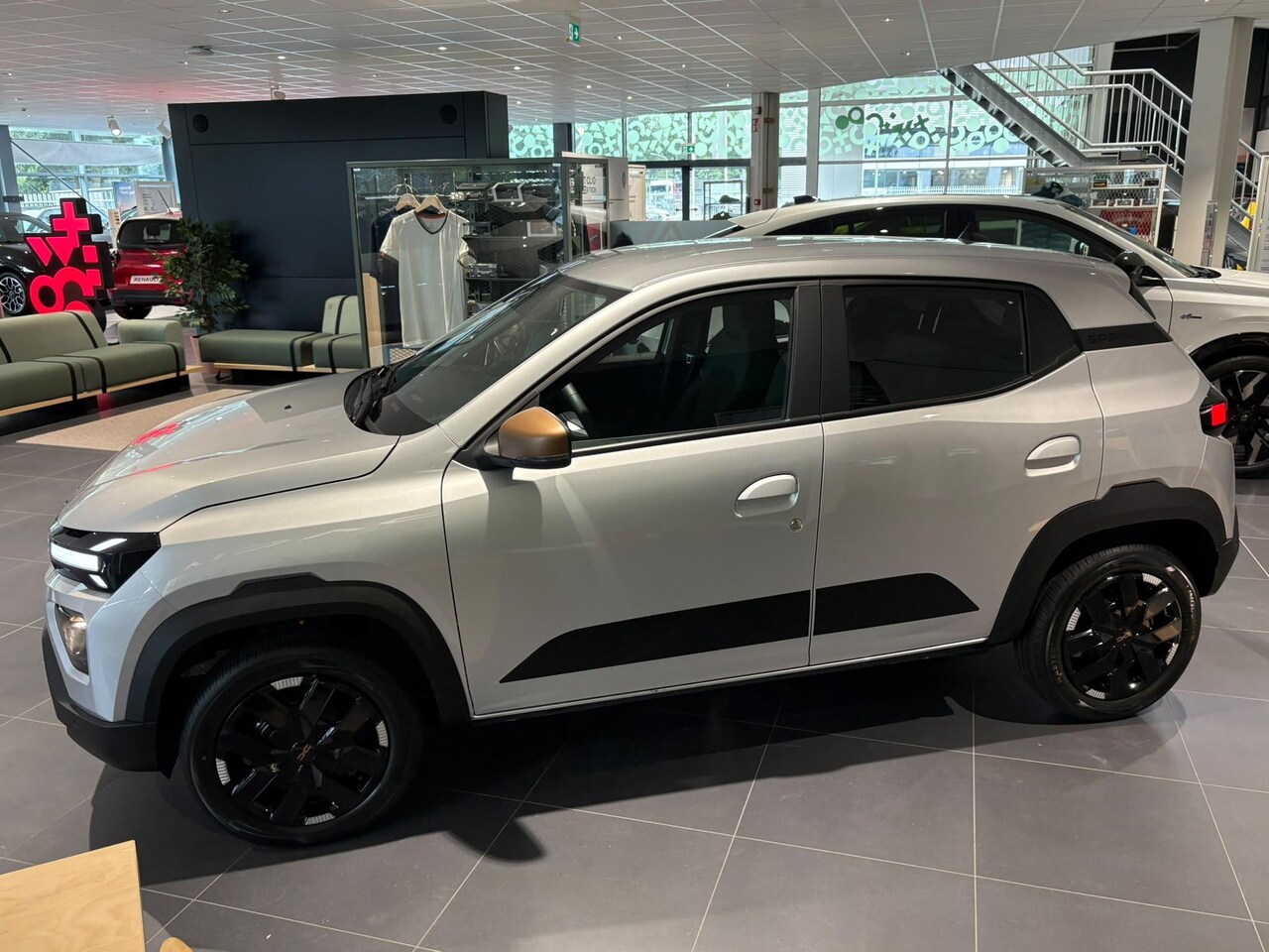 Dacia Spring - Expression 70 24.3 kWh | Demo | Camera | Navigatie | Direct beschikbaar | - AutoWereld.nl