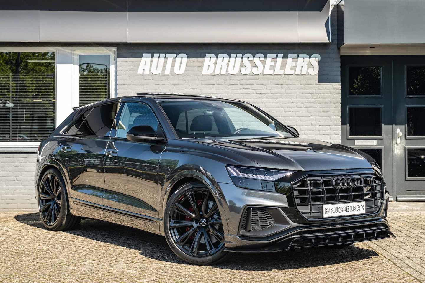 Audi Q8 - 55 TFSI e quattro Pro Line Plus Rood stiksel 22" Pano SQ8 look - AutoWereld.nl