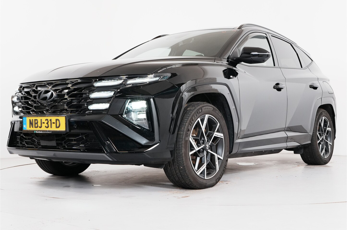 Hyundai Tucson - 1.6 T-GDI PHEV N Line Sky 4WD | Trekhaak | HUD | Pano | 360° | Cruise adaptief | SOH 100% - AutoWereld.nl