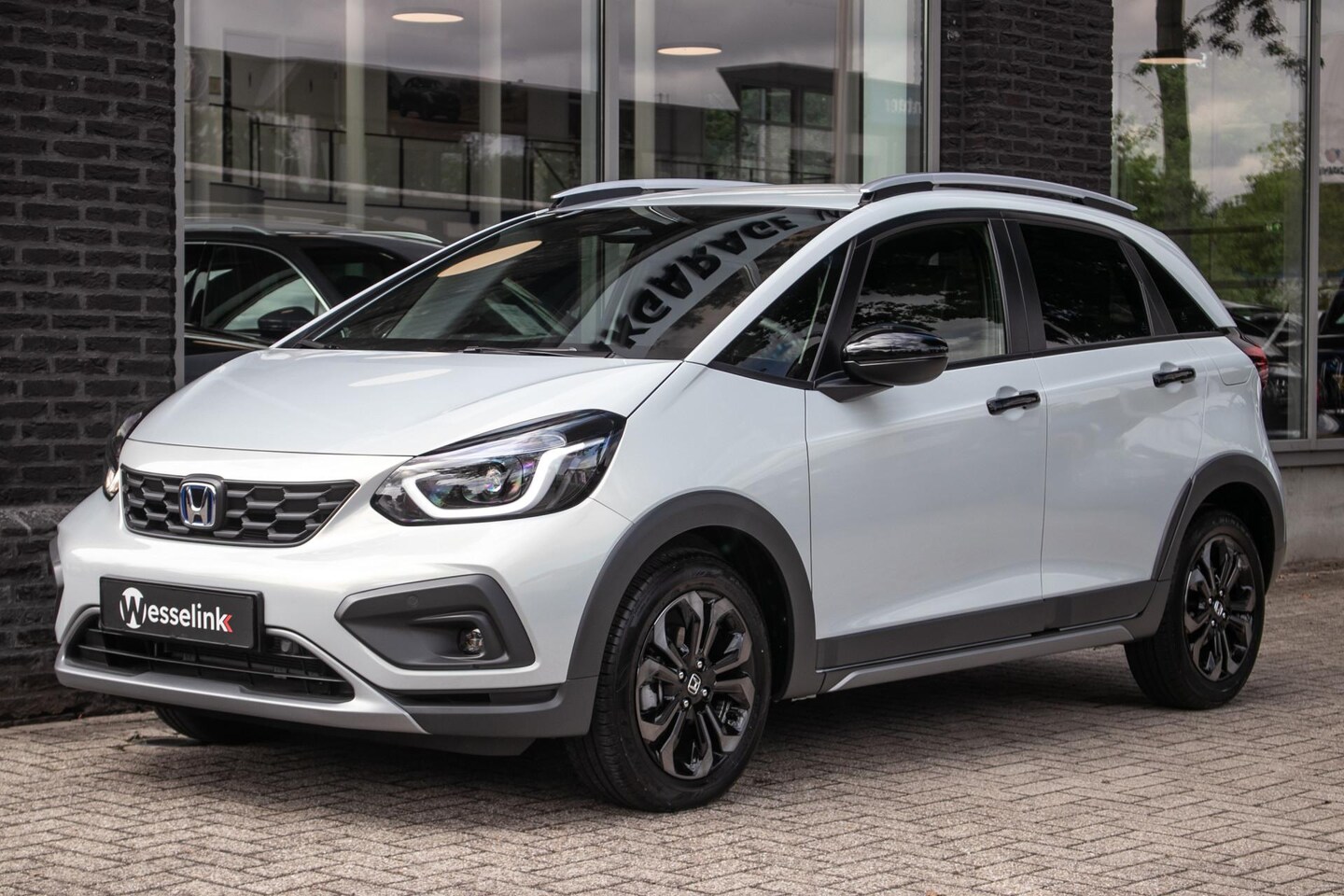 Honda Jazz - 1.5 e:HEV Advance Crosstar | Honda Sensing | Apple cp/Android auto - AutoWereld.nl