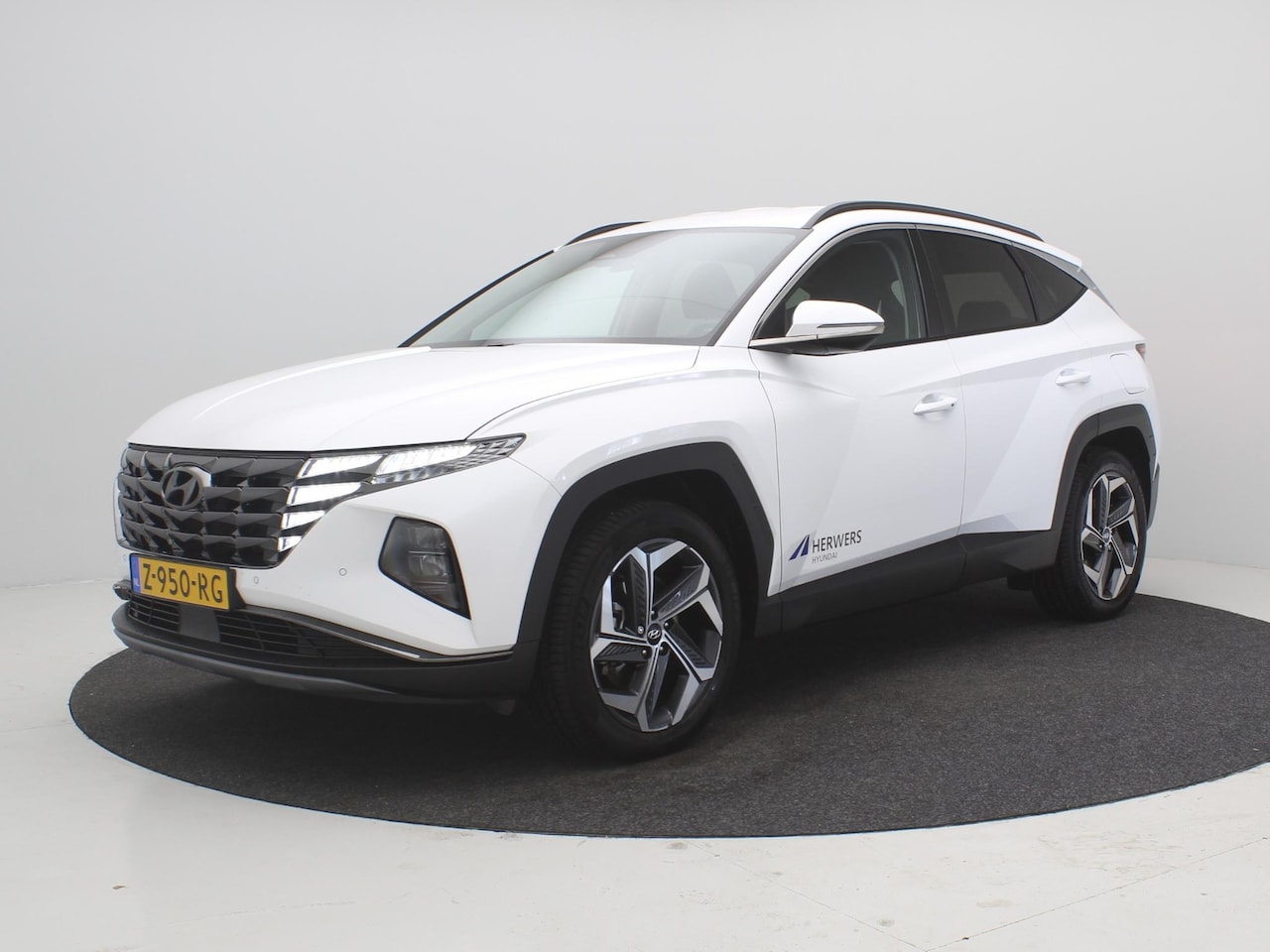 Hyundai Tucson - 1.6 T-GDI PHEV Comfort Smart 4WD / 1350KG Trekgewicht / Navigatie + Apple Carplay/Android - AutoWereld.nl