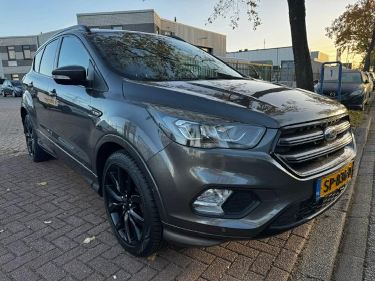 Ford Kuga - 1.5 EcoBoost ST Line Airco/ECC,Navi,Camera EXPORT PRIJS EXL. BPM - AutoWereld.nl