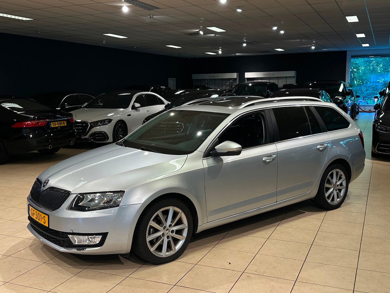 Skoda Octavia Combi - 1.6 TDI Greentech Ambition|PANO|NAP|STOELVW - AutoWereld.nl