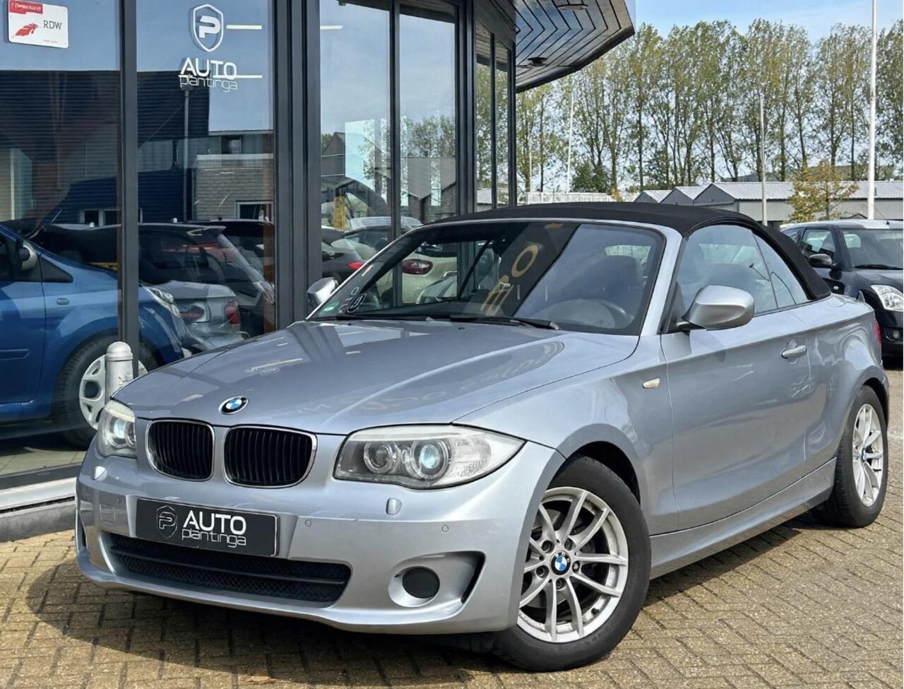 BMW 1-serie Cabrio - 118i High Executive 143PK | BI-Xenon | Navigatie | Cruise control | Climate control | Lede - AutoWereld.nl