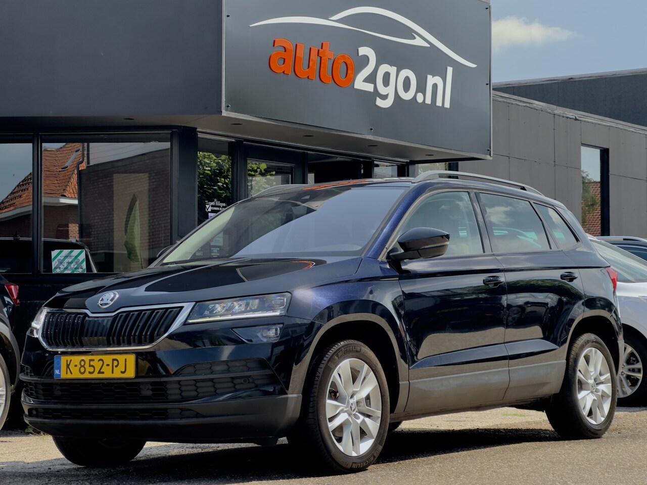 Skoda Karoq - 1.5 TSI AUT7/DSG ACT EDITION LEDER NAVI AIRCO PARK-ASSIST APPLE-CARPLAY LED LMV PDC - AutoWereld.nl