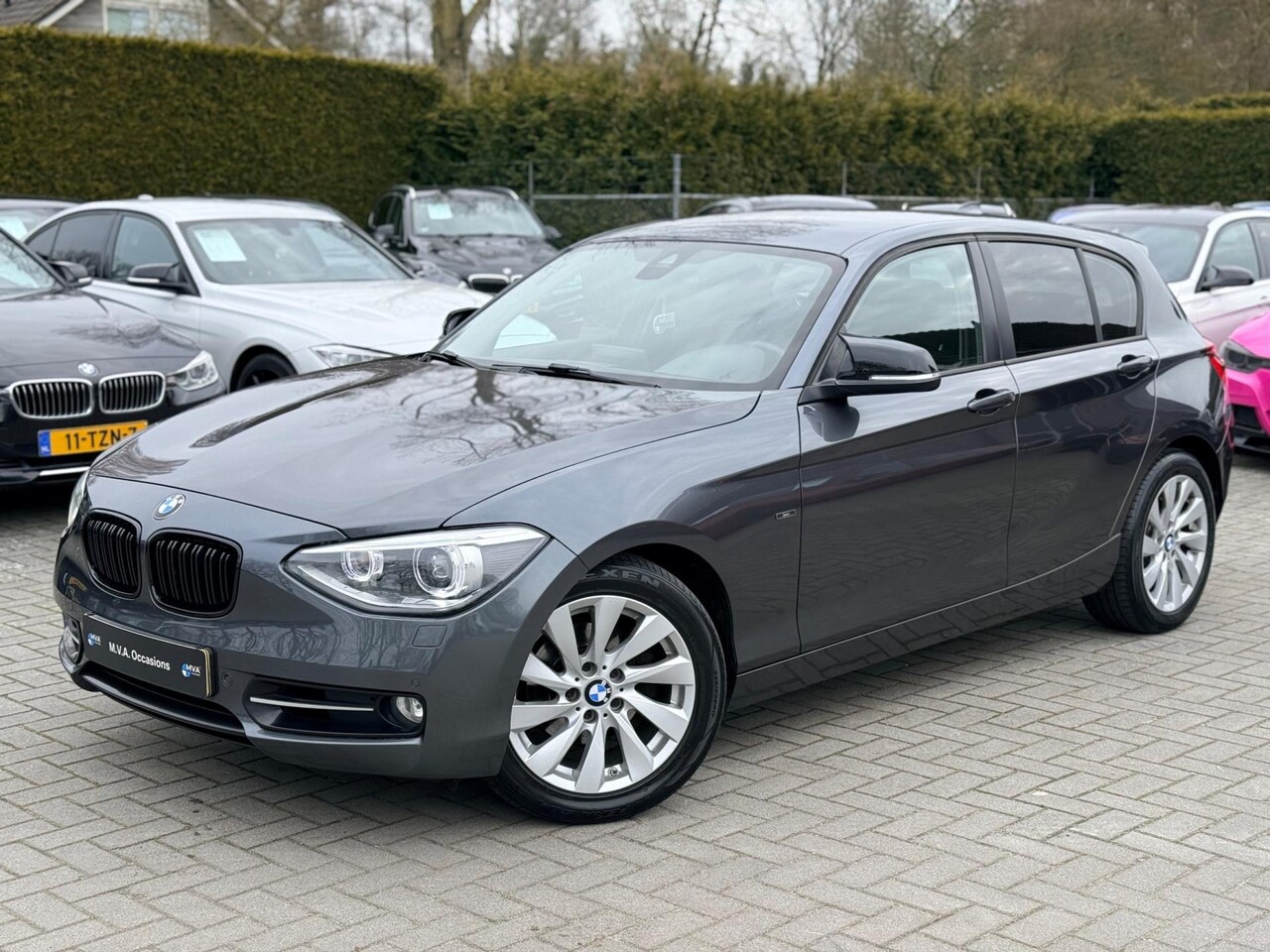 BMW 1-serie - 118i Business Sport|Ketting + Klepseals vervangen|Navigatie|Cruise control|Climate control - AutoWereld.nl