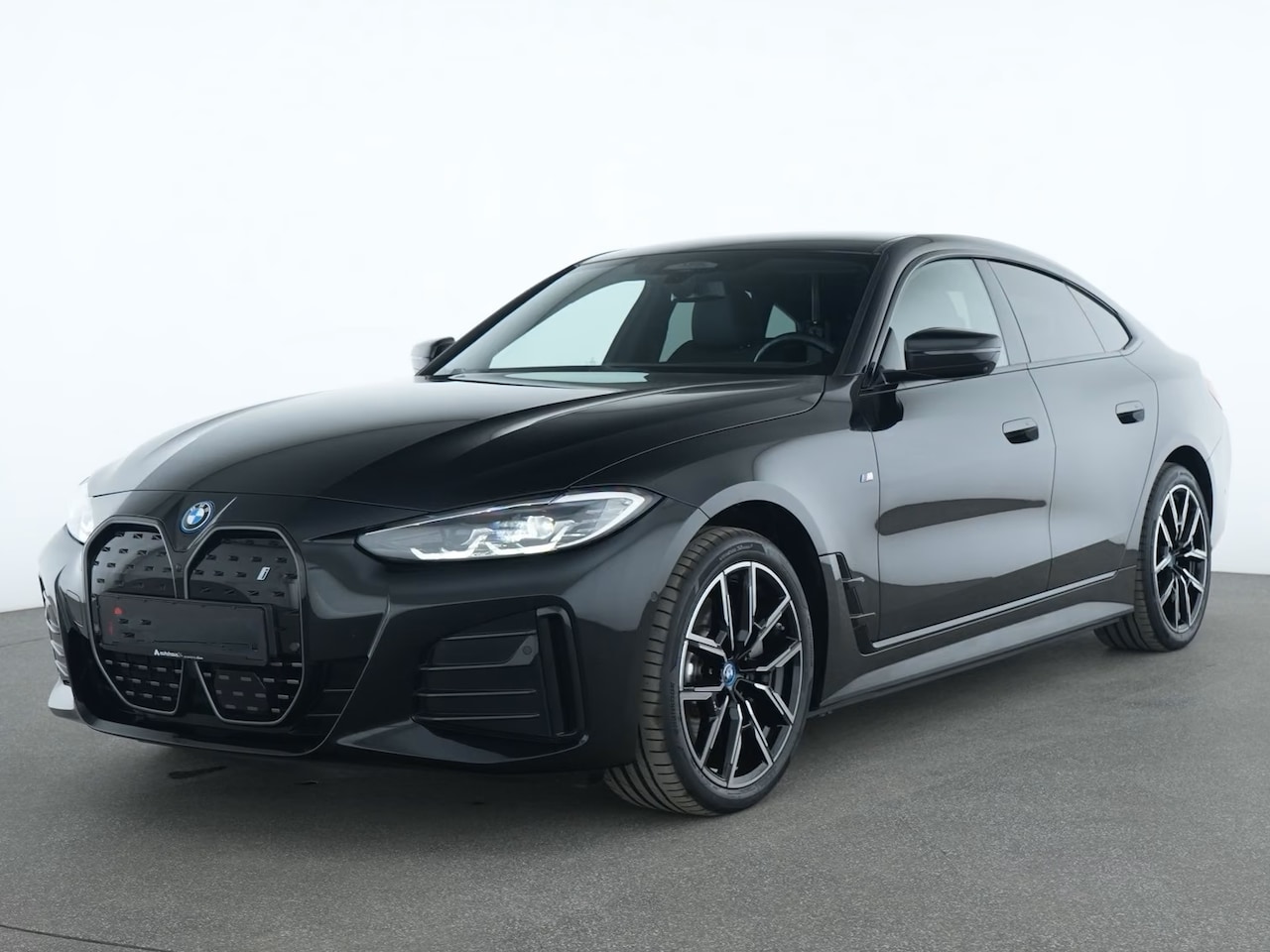 BMW i4 - eDrive35 70 kWh M-SPORT ** LED, DR. ASS+, TREKH, H&K SOUND, 19-inch LMV ** 1e EIG - UNFALL - AutoWereld.nl