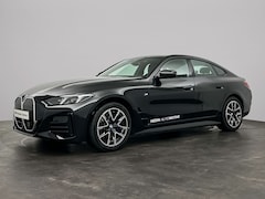 BMW i4 - eDrive40 M Sport Edition 84 kWh | Trekhaak | Comfort Access | Schuifdak | Camera | Hi-Fi |