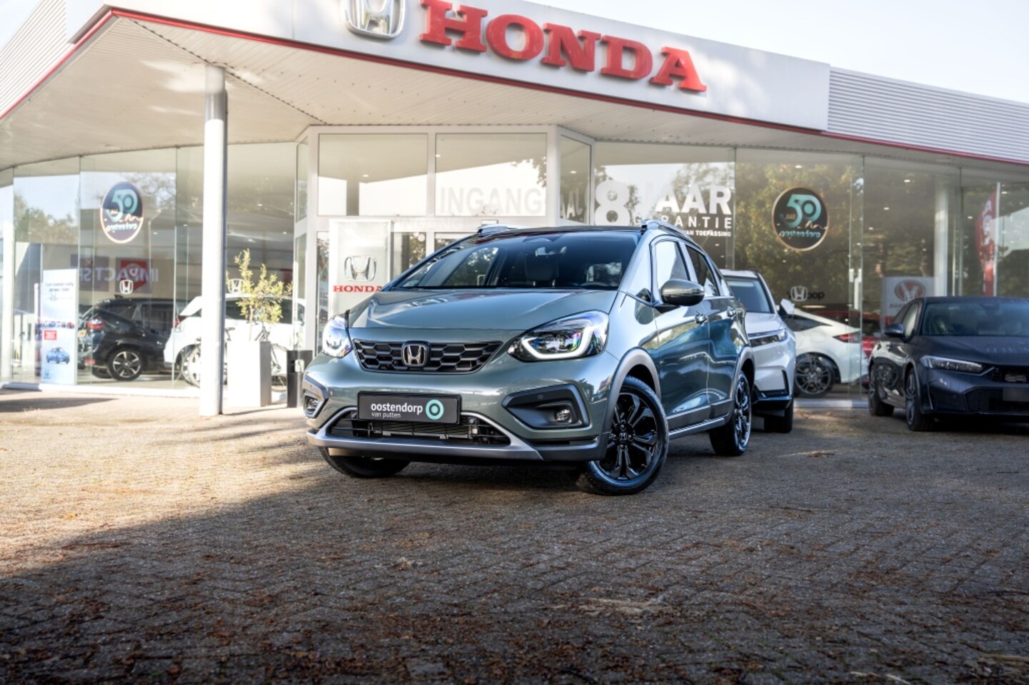 Honda Jazz - 1.5 Full Hybrid Automaat Advance Crosstar | Sage Green Pearl | 8 jaar garantie | Nieuwe au - AutoWereld.nl