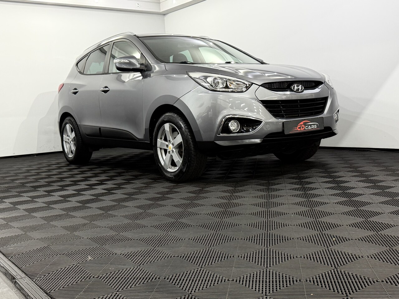 Hyundai ix35 - 2.0i Business Edition Camera, Navi, Cruise control, Stoelverwarming, Clima, Half leder, Li - AutoWereld.nl
