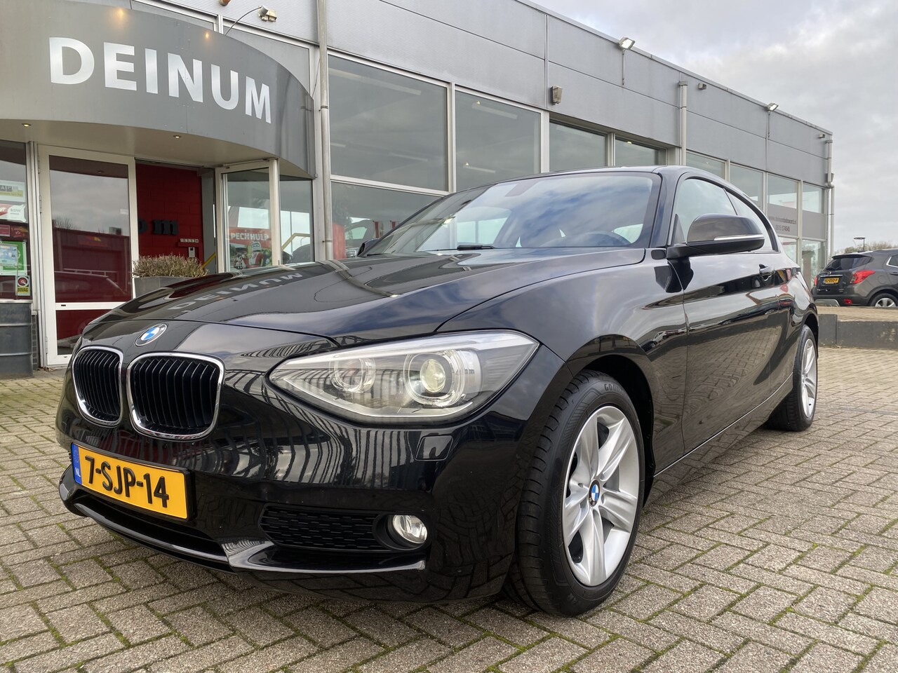 BMW 1-serie - 114i EDE Business+ Navigatie, Parkeersens, LMV, Bluetooth, etc.. - AutoWereld.nl