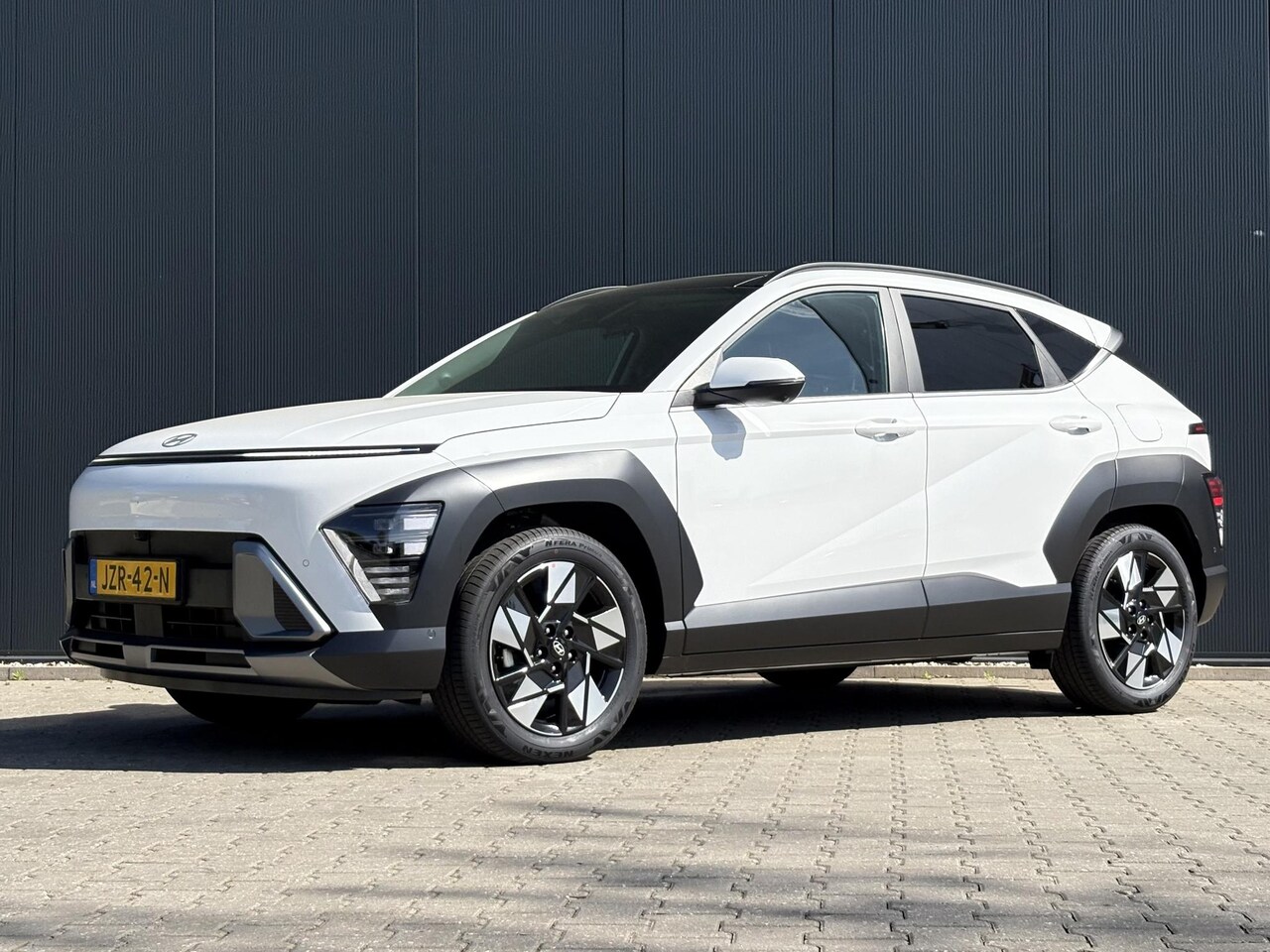 Hyundai Kona - 1.6 GDI HEV Premium Sky / Demo Deal / Trekhaak Afneembaar 13-Polig / Stoelverkoeling / Sto - AutoWereld.nl