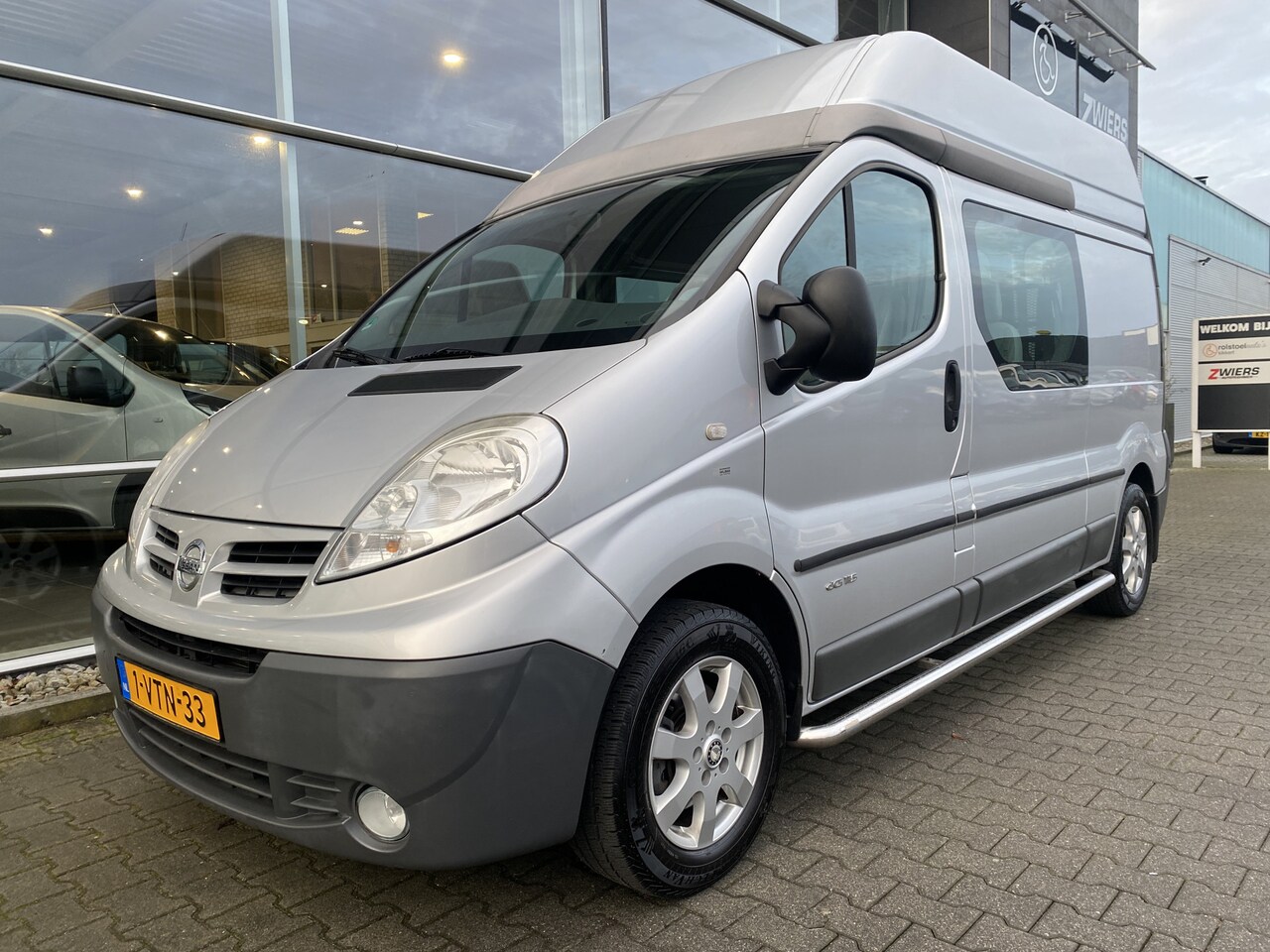 Nissan Primastar - 3+1 Rolstoelbus Side-to-Side 2.0 dCi L2H2 Acenta (Mooie ruime rolstoelbus met lift en side - AutoWereld.nl